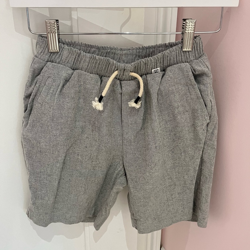 Boy grey, jogger material shorts. Perfect for a causal day out!